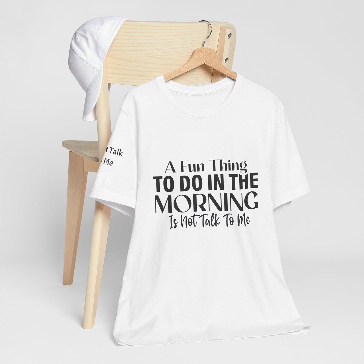 Fun Thing To Do In The Morning is Not Talk To Me Unisex Jersey Short Sleeve Tee Featuring Don't Talk To Me on the right sleeve of the T-shirt